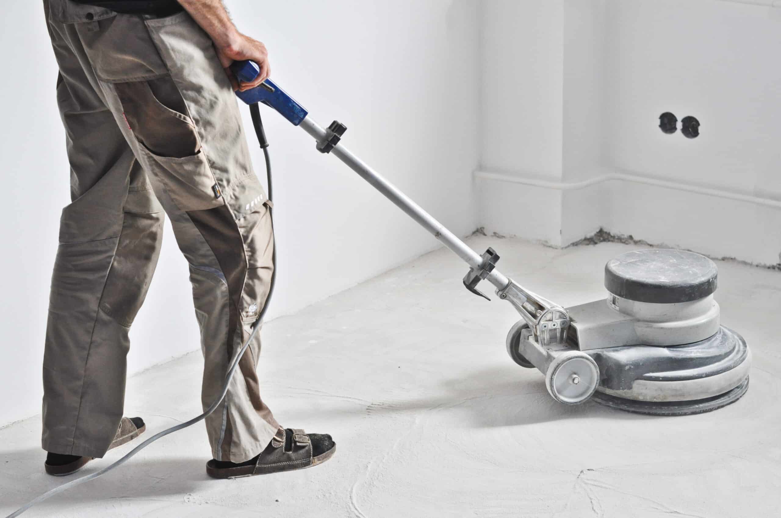 Removing Garage Floor Coatings Removing Garage Floor Coatings with an industrial grinder
