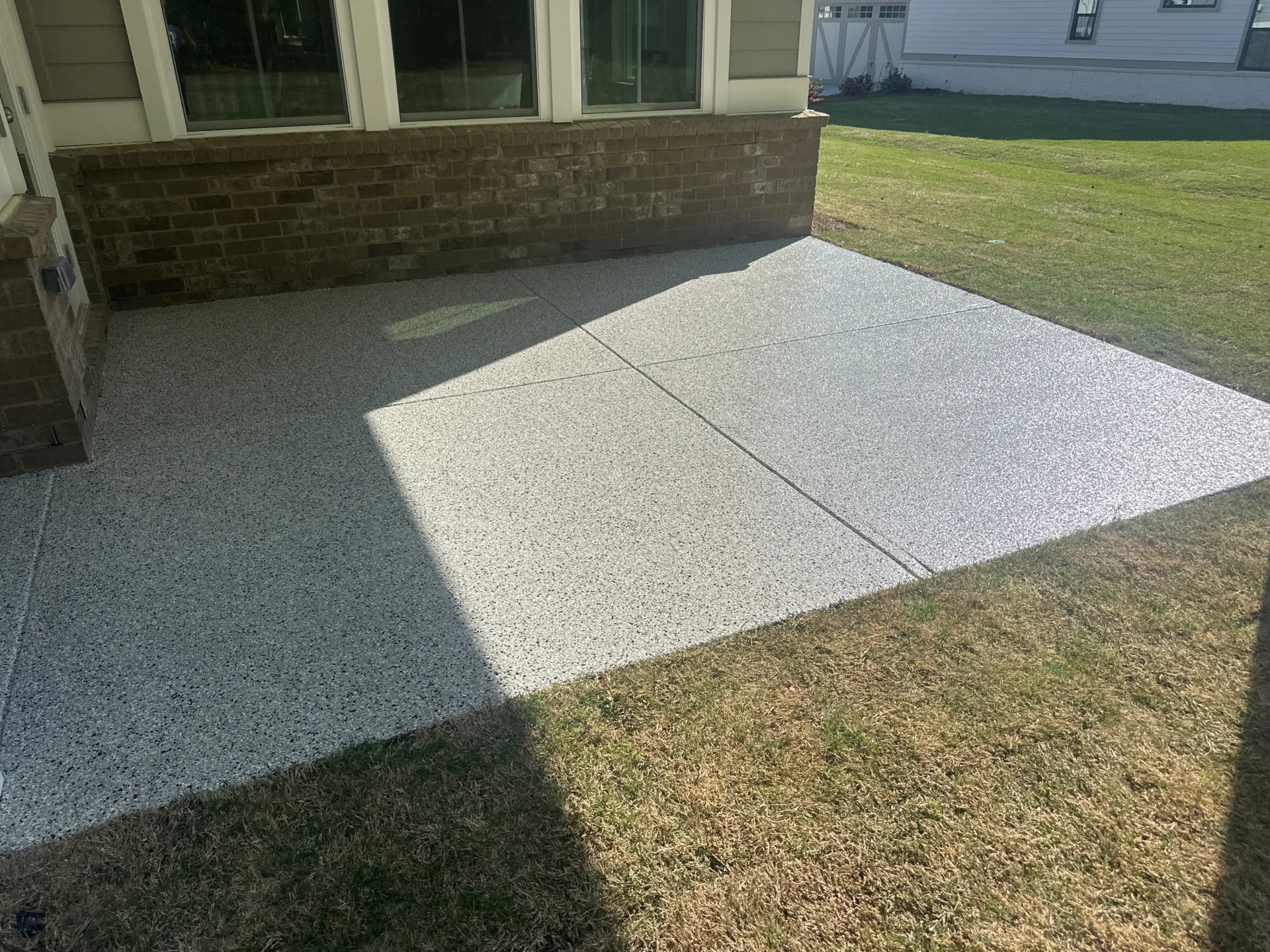 Project Spotlight: 2-Car Garage & Patio Floor Coating in Cumming, GA